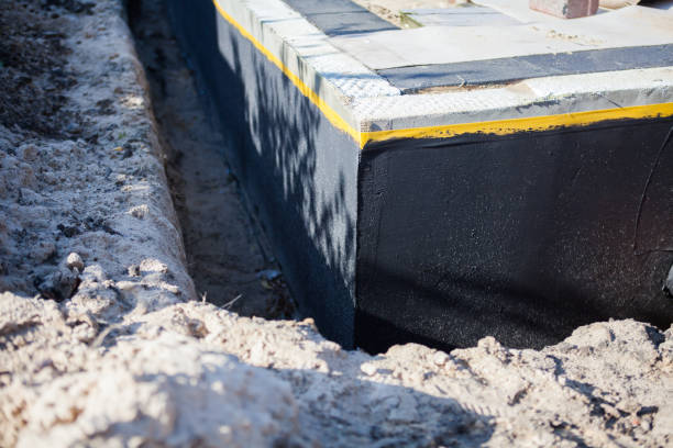 Professional Waterproofing technician working in Celina, OH